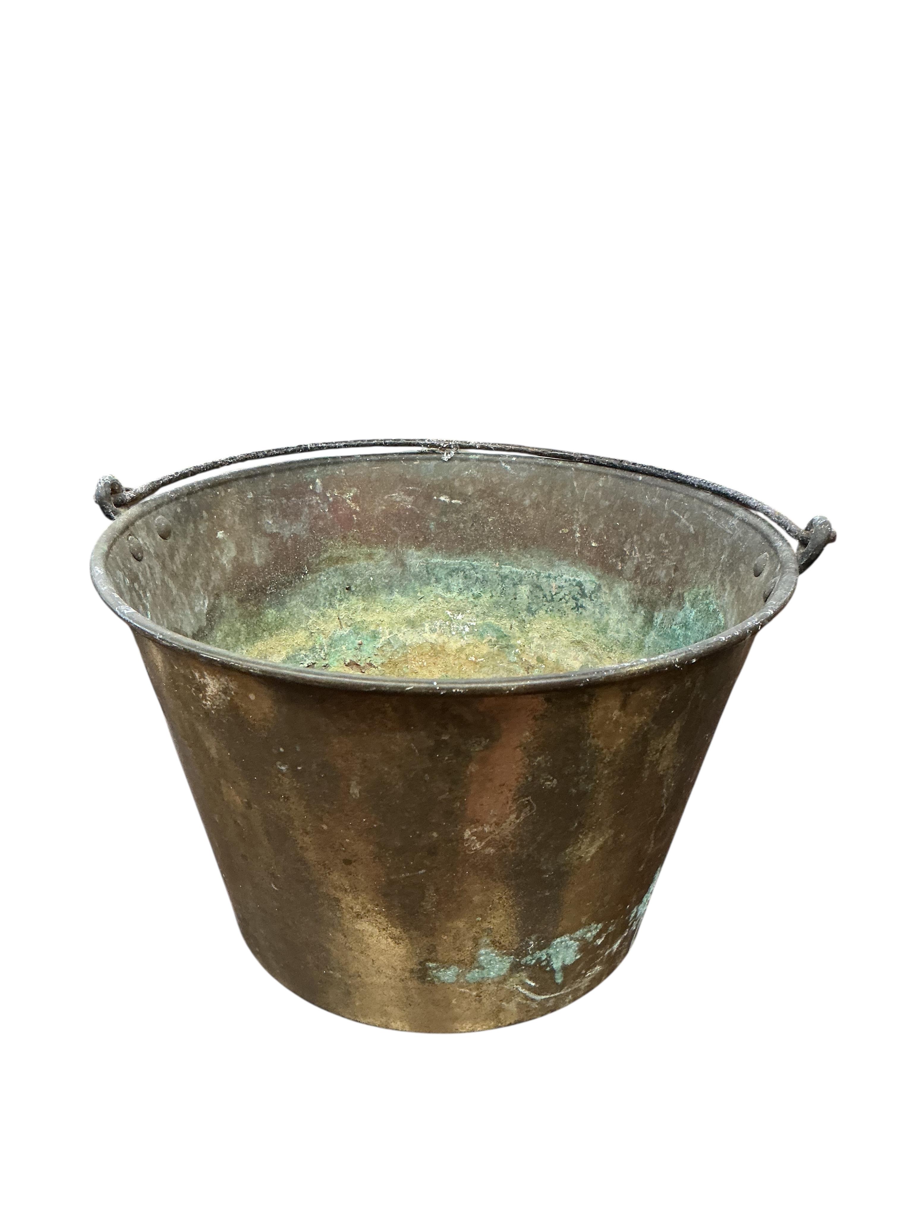 Two 19th century brass pans, larger diameter 34cm